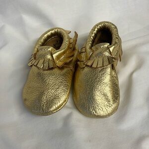 Infants Gold moccasin shoes size 3 months